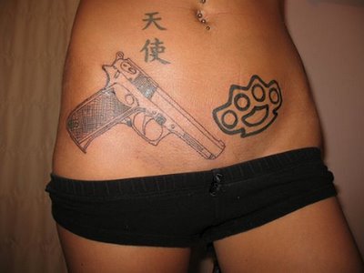 sexy-gun-tattoos.jpg