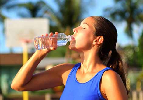 women-drinks-water-bottle-hea.jpg