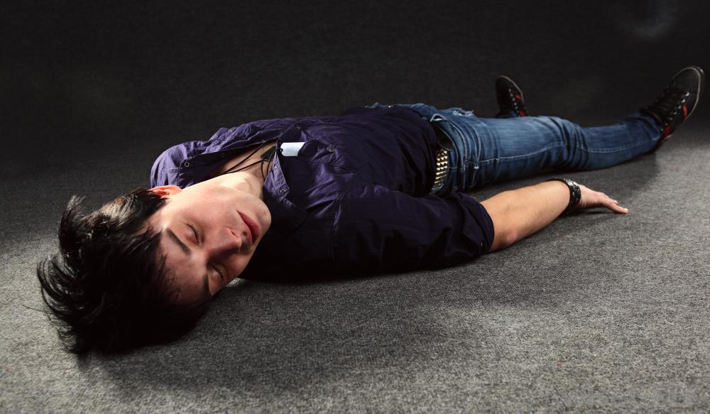 man-lying-on-floor-unconscious.jpg