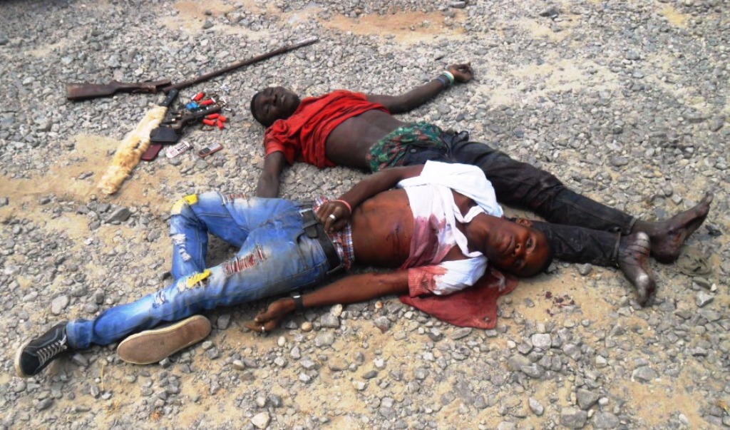 the-alleged-armed-robbers-shot-dead-and-the-recovered-arms.jpg