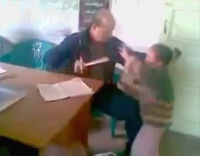 image-1315174370-09-04-windows-media-video-v11-512-kbps-video-5-teacher-beat-kids.jpg