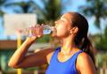 women-drinks-water-bottle-hea.jpg