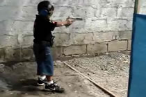 little-kid-at-a-shooting-rangejpg